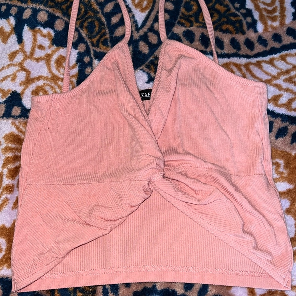 pink tank top, with crisscross ribbed